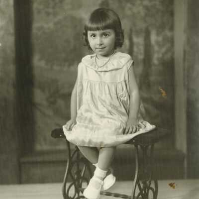 Girl Sitting on Bench