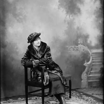 Woman Sitting in Chair