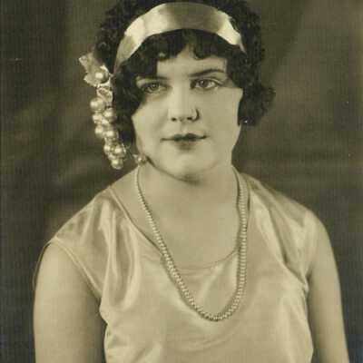 Young Woman Wearing Headpiece