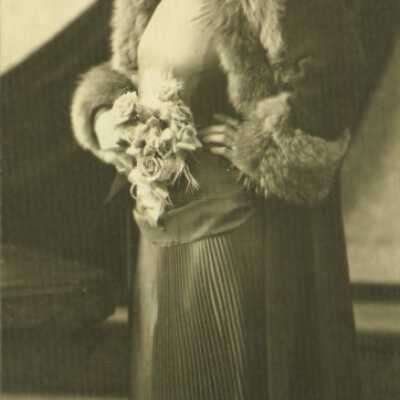 Woman Wearing Fur-trimmed Coat