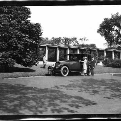 Couple with Automobile and Driver