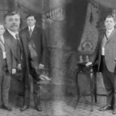 Double Exposure of Four Men