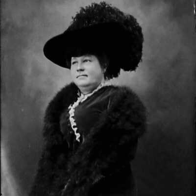 Woman Wearing Hat with Ostrich Feather