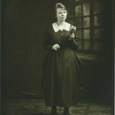 Woman Holding a Flower
