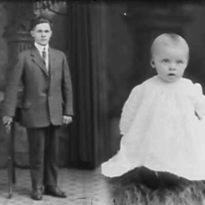 Young Man and Photo of Baby