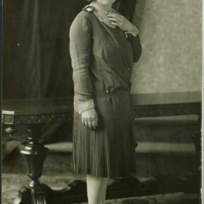 Woman Wearing Pearl Necklace