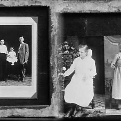 Double Photo of Parents and Child with Two Photos Opposite