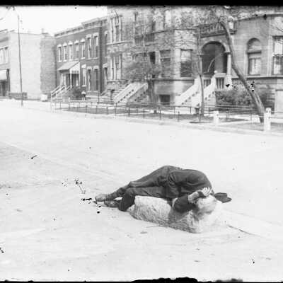 Man Asleep on Street