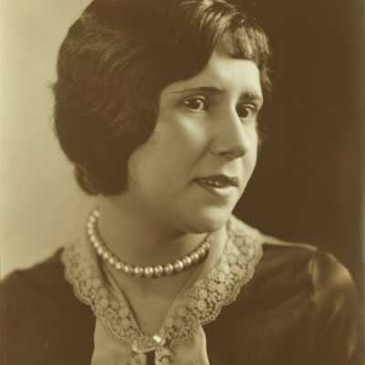 Young Woman Wearing Pearl Necklace