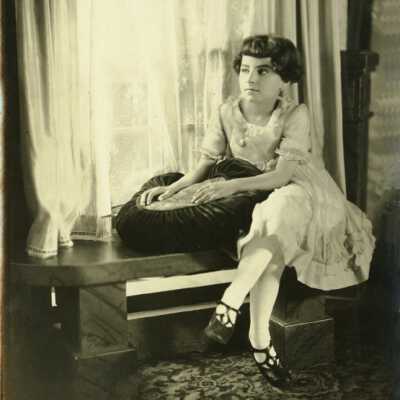 Girl Sitting at Window