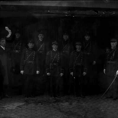 Group of Men in Military-Style Uniforms (Band????)