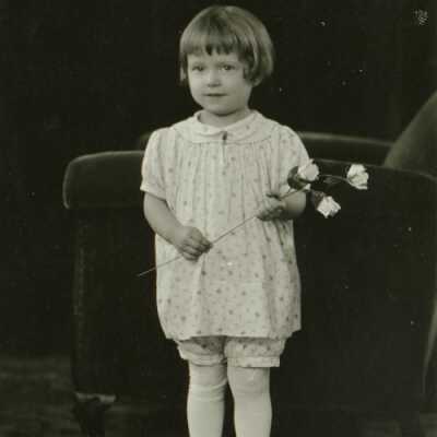Girl Holding Flowers