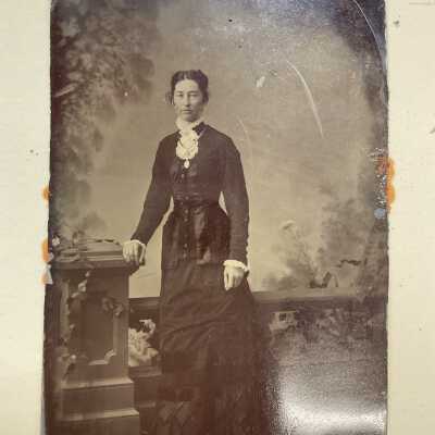 Handcolored portrait of standing woman