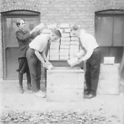 Three Men Packing Box