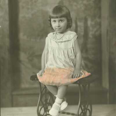 Girl Sitting on Bench