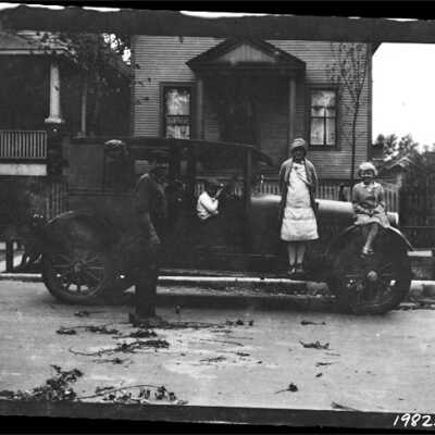 Man and Children with Automobile