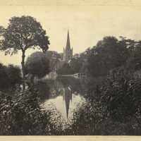 Landscape with reflected church spire