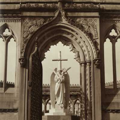 Statue of Angel Holding Wheat