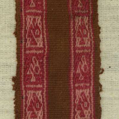 Textile fragment with stylized bird motif