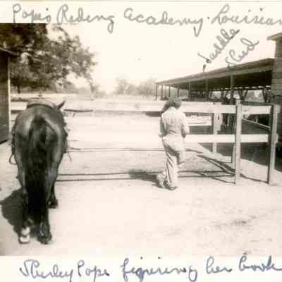 Camp Claiborne - Pope Riding Academy - Shirley Pope by Saddle Shed - Sept. 19, 1943