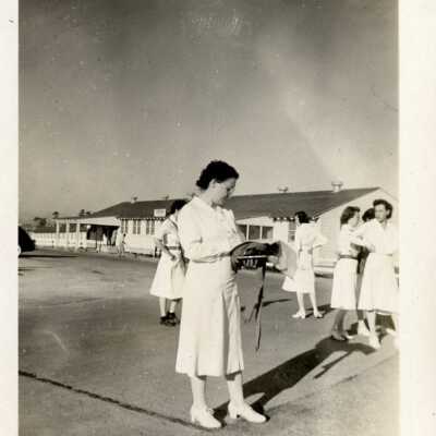 Head Nurse outside Nurses Barracks