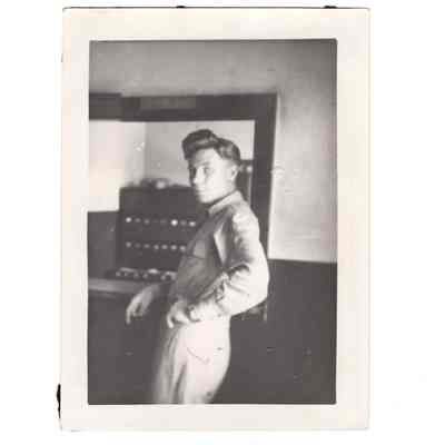 Servicemember posing for photo at Camp Claiborne