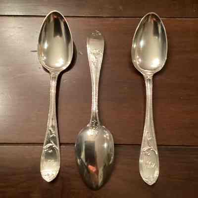 Large silver serving spoons