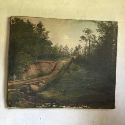 Dirt Road in a wooded Landscape