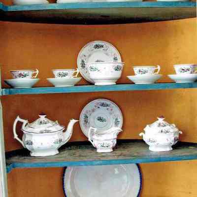Tea Service on display with other objects in Southwest Parlor, CHH