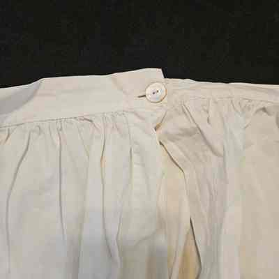 Button at waist