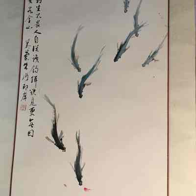 A School of Fish Chasing Flower Petals