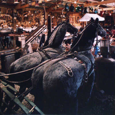 Storage Area at Uncle Sig's Jugville with Horses and Tools. US 81, Auburn, ND. 11/04/00