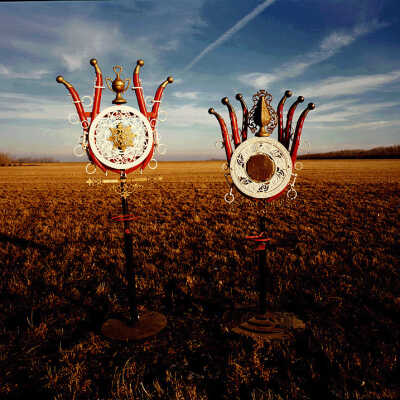 Two Sculptures at Uncle Sig's Jugville. US 81, Auburn, ND. 1/29/81