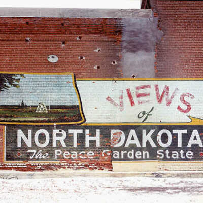 Views of North Dakota Mural by Charles Olive on Wall of Prison Yard. State Penitentiary, Bismarck, ND. 2/6/81