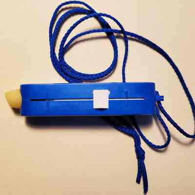 White sliding button to control balm for use