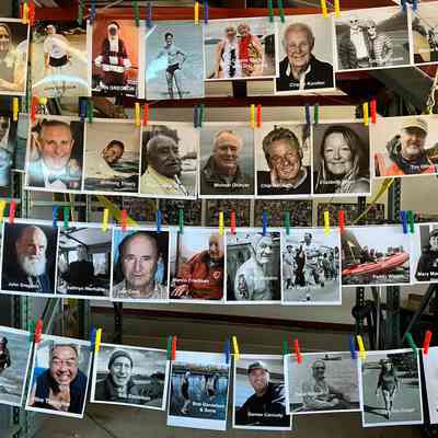 Photos of those honored displayed in SERC boathouse