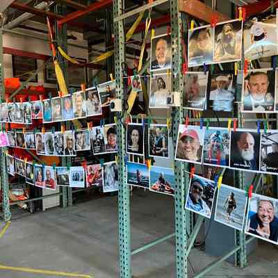 Photos of those honored displayed in SERC boathouse