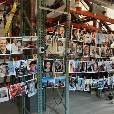 Photos of those honored displayed in SERC boathouse