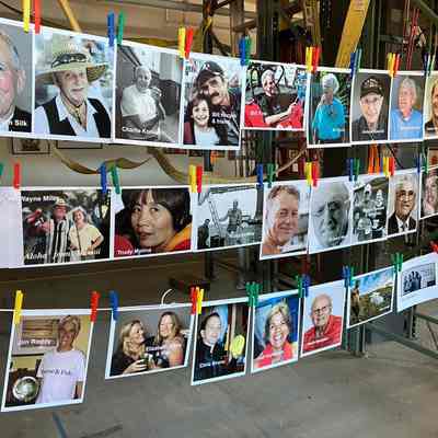 Photos of those honored displayed in SERC boathouse
