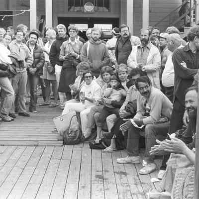 Image 198526b - Members wait to find out if their name is drawn in the lottery.