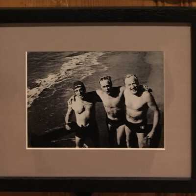 Three swimmers on the beach
