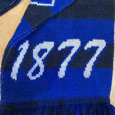 1877 on right end (logo on other side of right end)