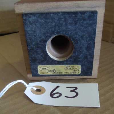 underside of artifact with trophy dealer's information