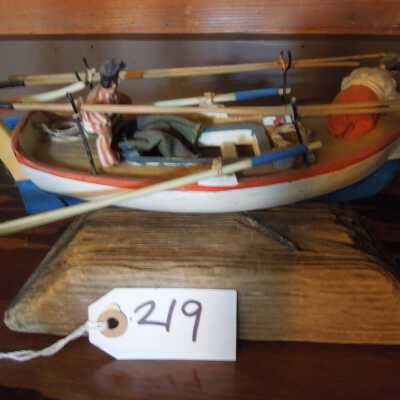 Model boat with two men