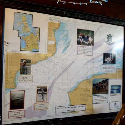 Framed maps with photographs