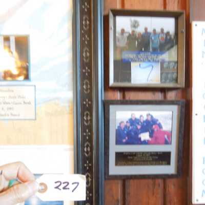 Dolphin Channel swimmers, 2 framed photos.