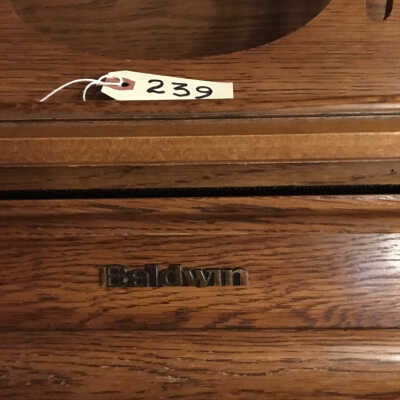 Baldwin insignia on piano