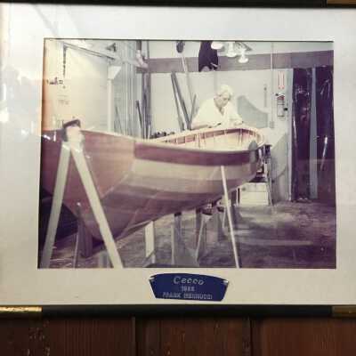 Frank Mennucci in boat shop with boat CECCO