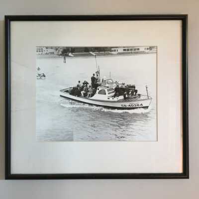 Two views of a Boat of Swimmers on way to Port Point Swim, 1964