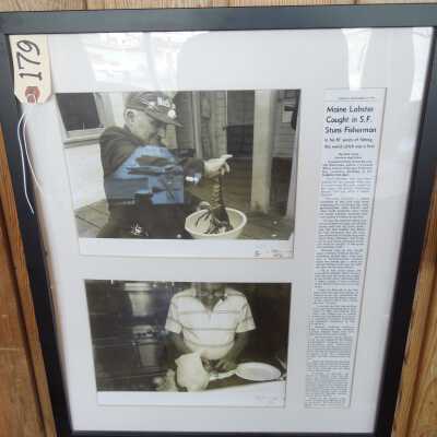 Framed photos with newspaper article